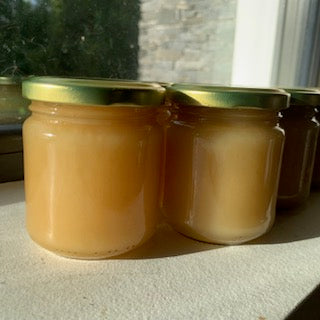 two jars of soft set honey