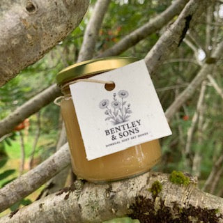A Jar of Soft Set Honey in a wild environment